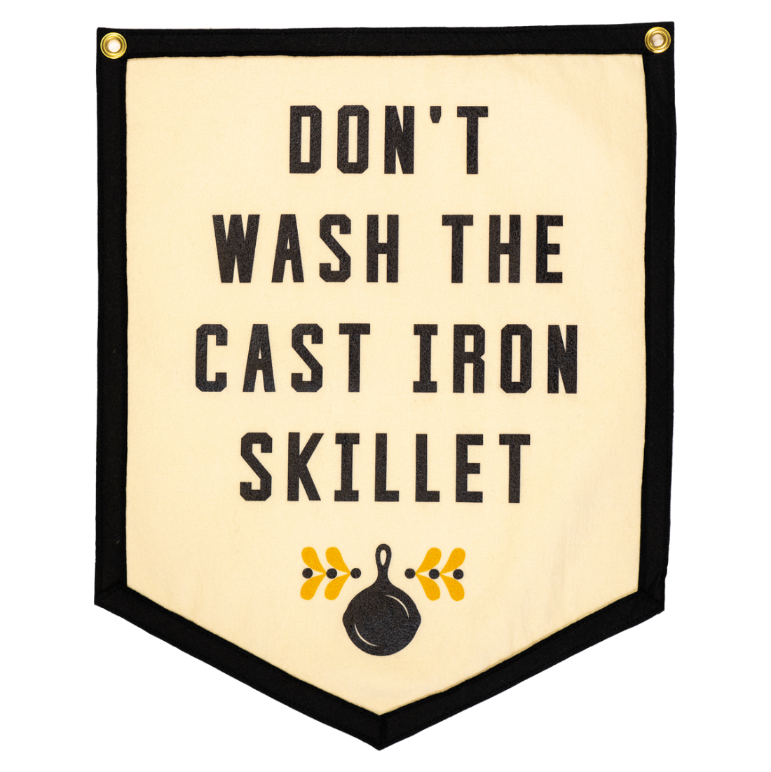 Decorative banner with text 'Don't wash the cast iron skillet' on a beige background.